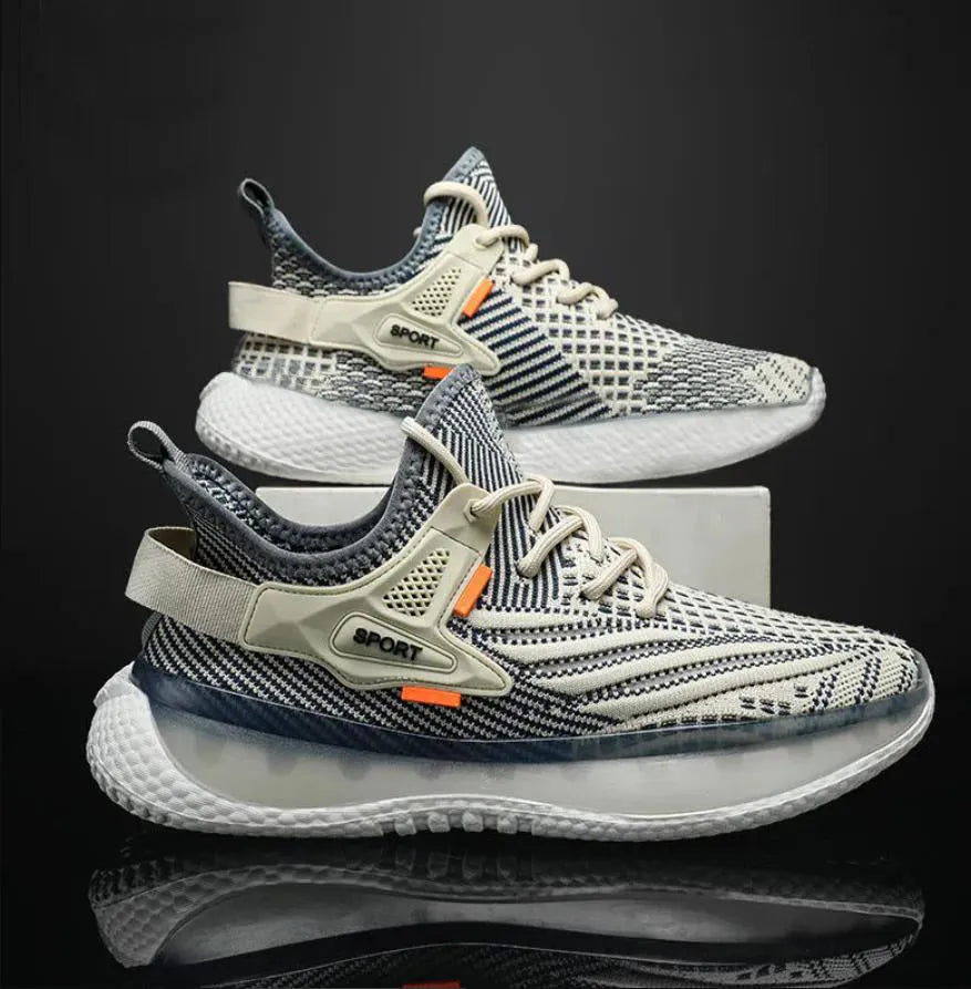 Men's white low-top platform sneakers with mesh upper and flat rubber sole on a plain background.