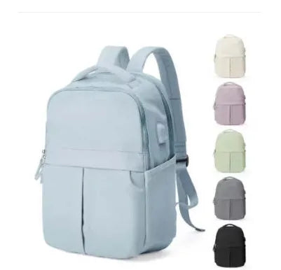 Nylon travel computer backpack with vertical square shape, zipper closure, and double-joint shoulder straps in green on white background