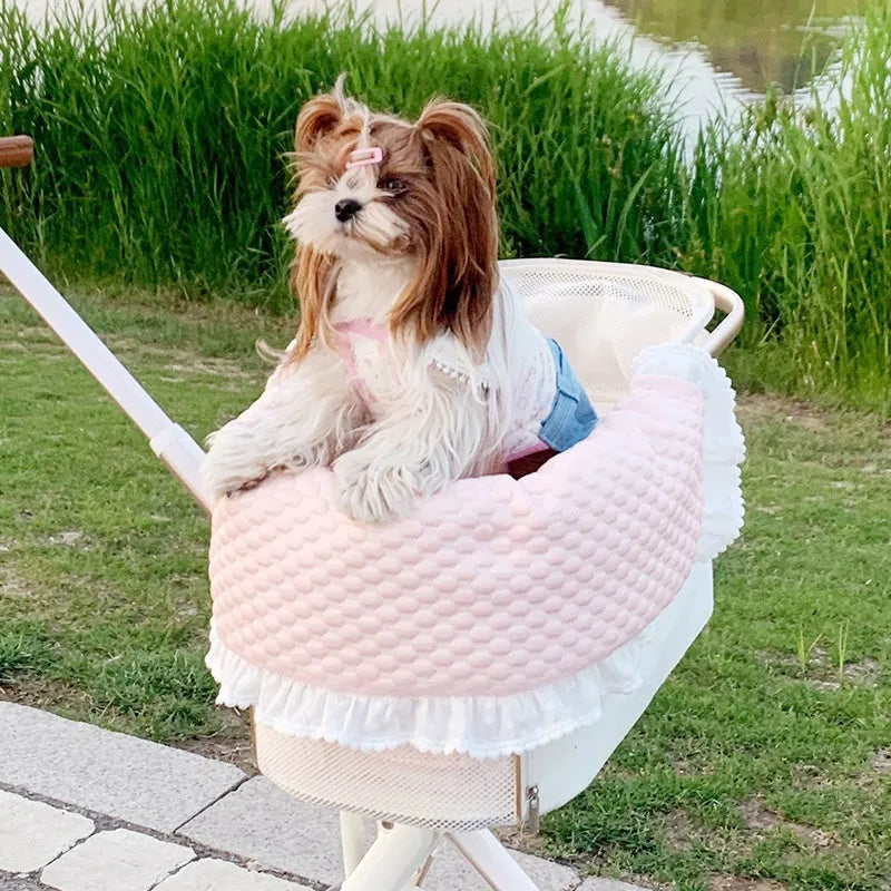 Pet stroller three-piece set showing removable towel, cushion and pillow in floral pattern