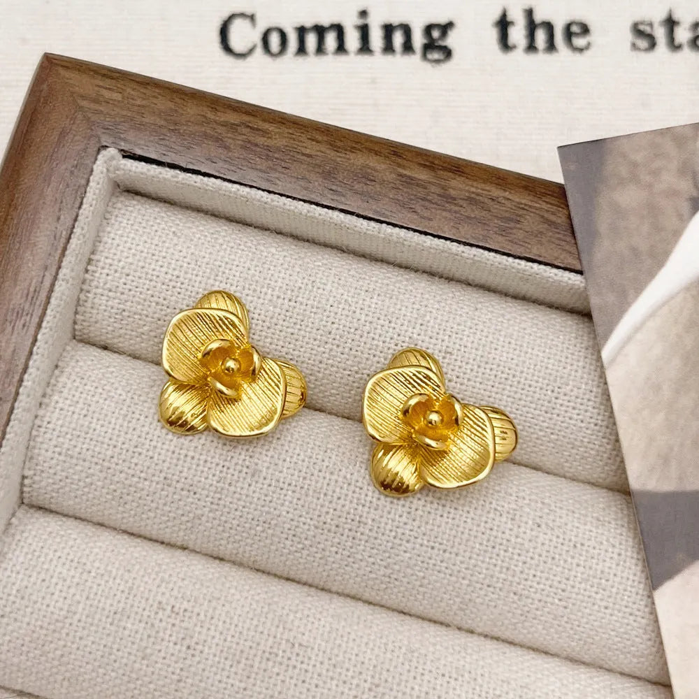 Retro flower earrings for women in gold or silver electroplated finish with petal design