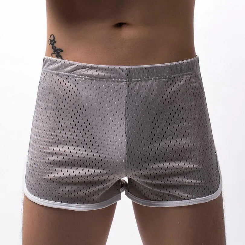 Men's cotton three-point fly boxer shorts in black, grey, dark blue, light blue, and white.