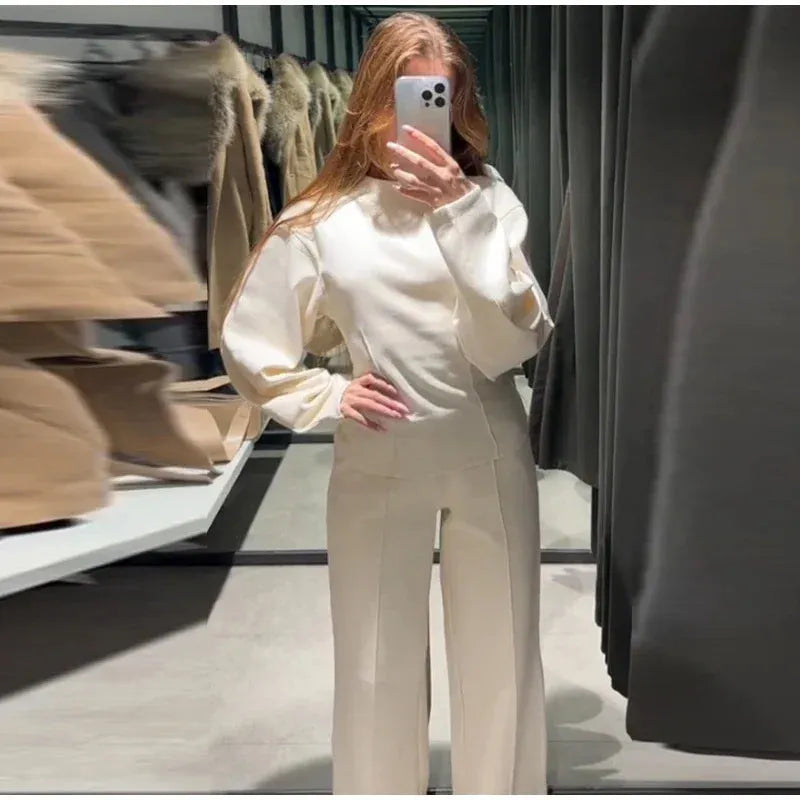 Women's polar fleece suit set showing O-neck pleated top and wide leg trousers in coordinating colours