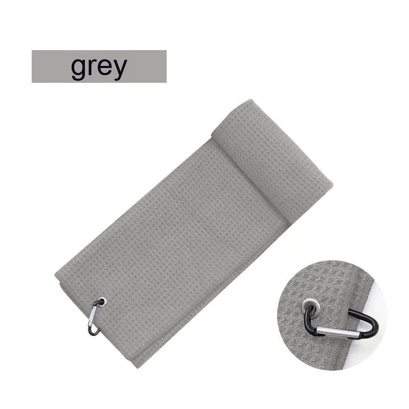 Waffle weave golf ball and club cleaning towel in blue colour showing textured surface