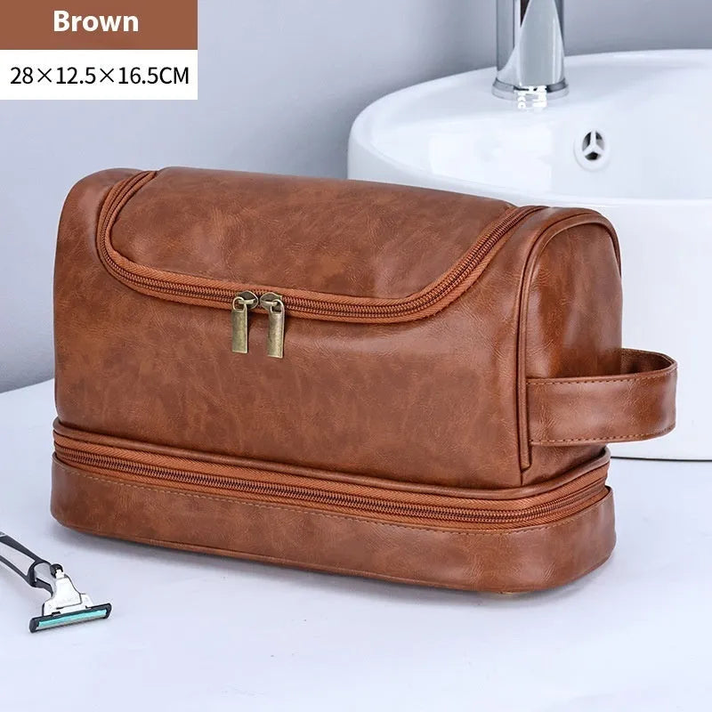 Leather travel toiletry bag in brown with hook, showing main compartment and portable design