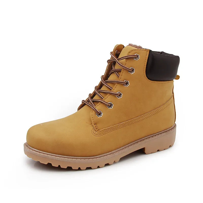 Men's pink high-top Martin boots with velvet lining, round toe, and front lace-up closure on a flat sole.