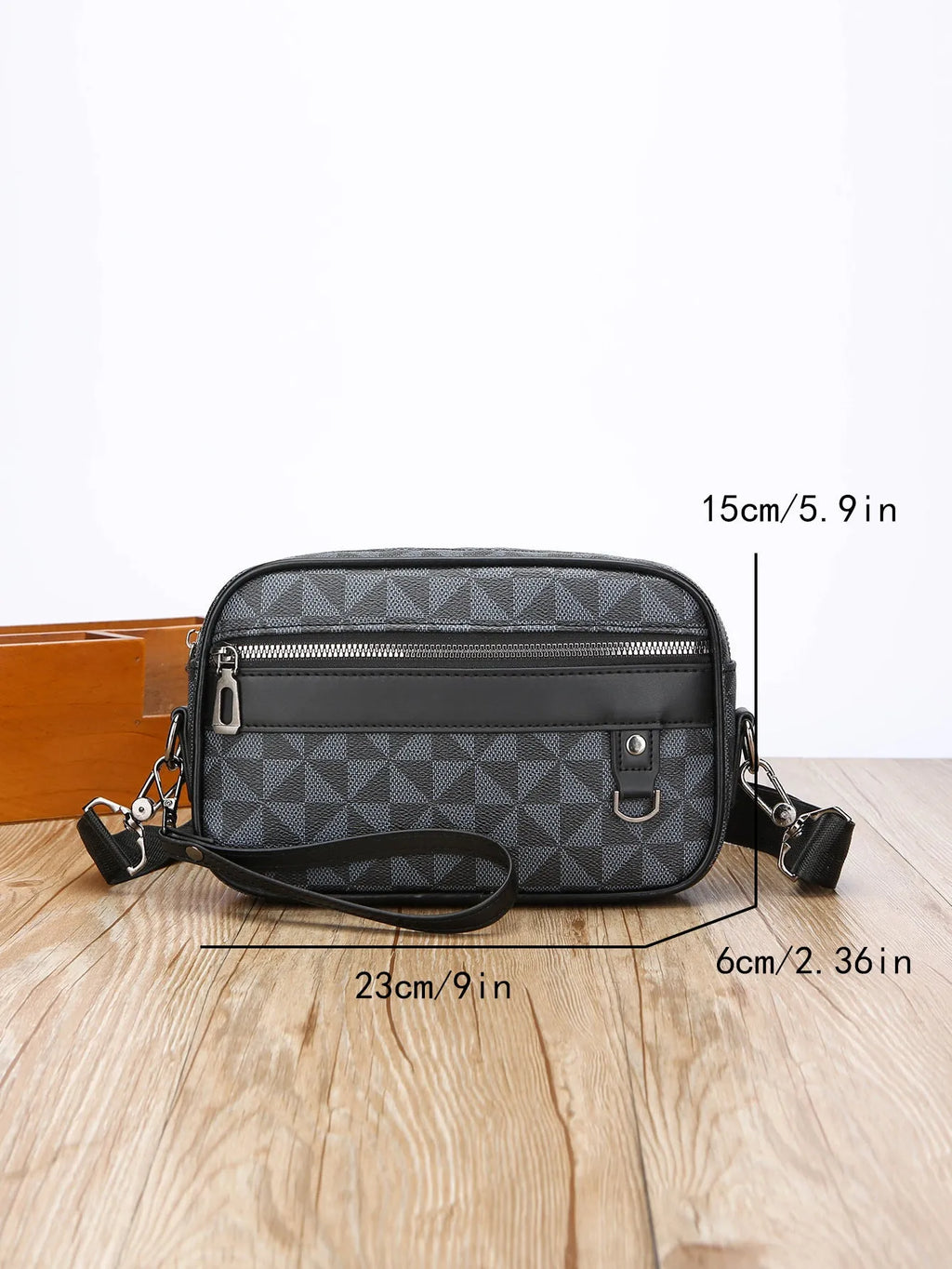 Men's black geometric pattern PU messenger bag with a shoulder strap, shown horizontally.