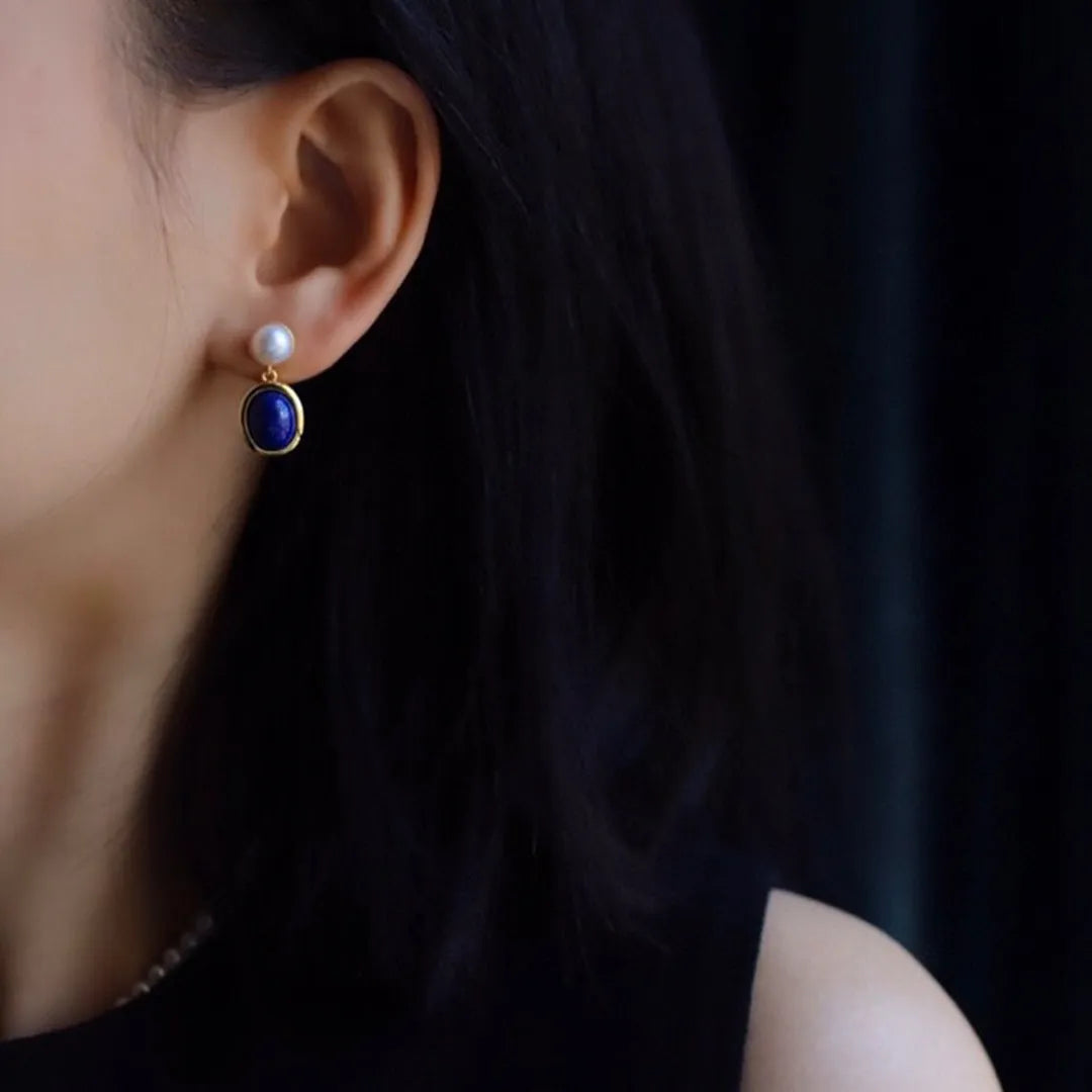 A pair of simple lapis lazuli pearl earrings made from 925 sterling silver with auspicious patterns.