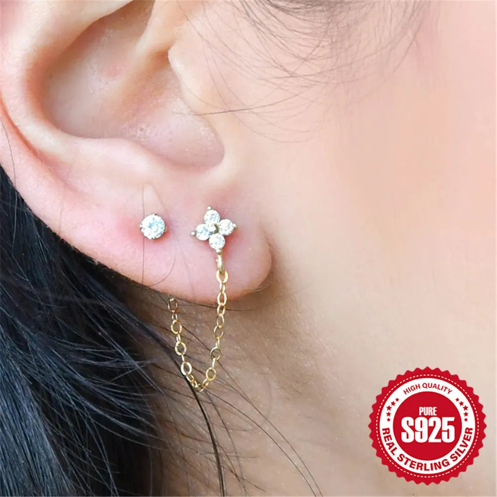 S925 sterling silver geometric ear clip stud earrings with flower, tassel, and chain design in golden electroplated finish.