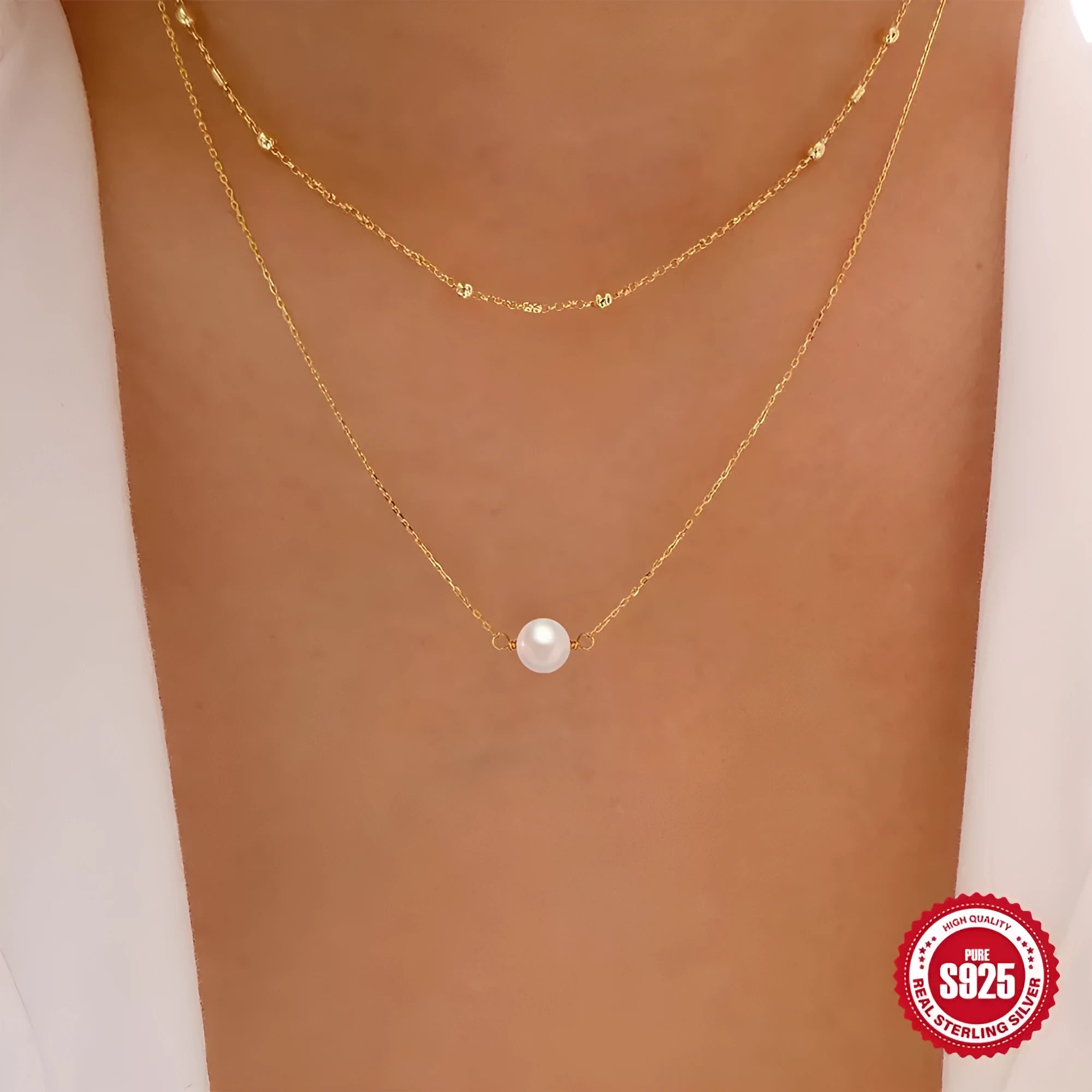 S925 sterling silver double layer necklace with twin geometric pearls in gold or white gold plating.