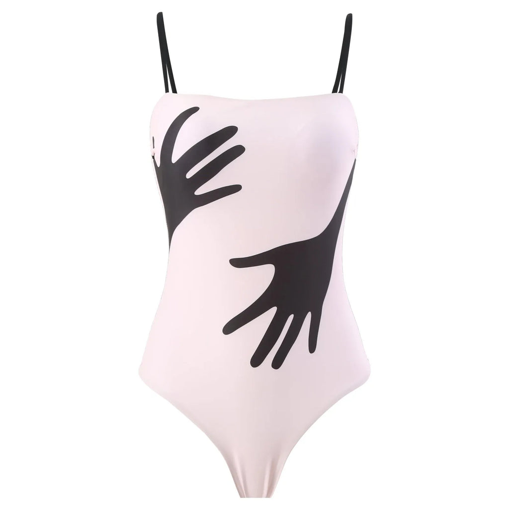 Women's patterned polyester swimsuit with attached tulle skirt in one-piece bikini design