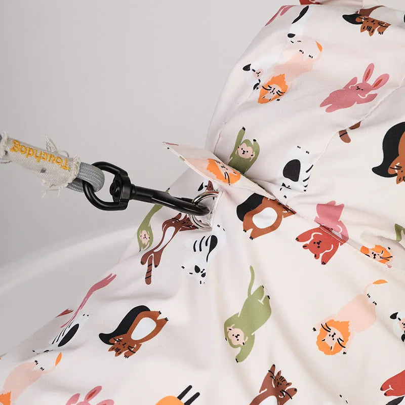 Beige dog raincoat with cartoon print, showing double waterproof PU coating and available in sizes S to XXL.