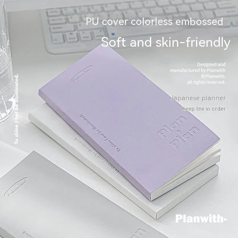 Embossed A5 daily meter notebook showing paper cover and open pages