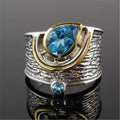 Blue zircon inlaid women's ring with Chinese style design and drop shape on alloy band