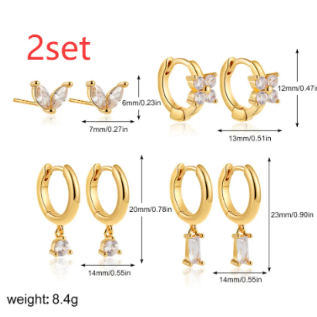 Geometric copper earring set with gold electroplated finish showing star and square shapes