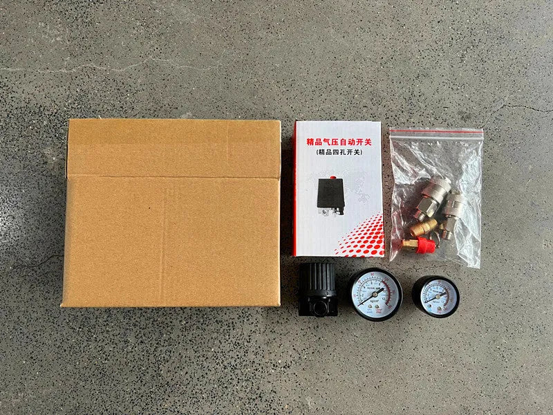 European style air compressor pressure switch with 12mm connector and voltage selector.
