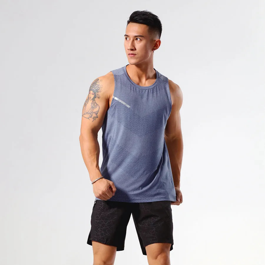 Man wearing a solid colour quick-dry athletic tank top for summer sports.