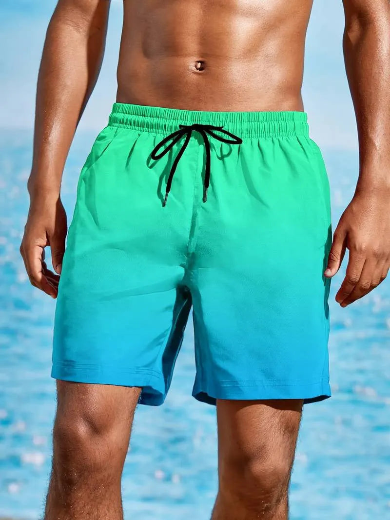 Men's grey gradient 3D digital print mesh sports shorts on a white background.