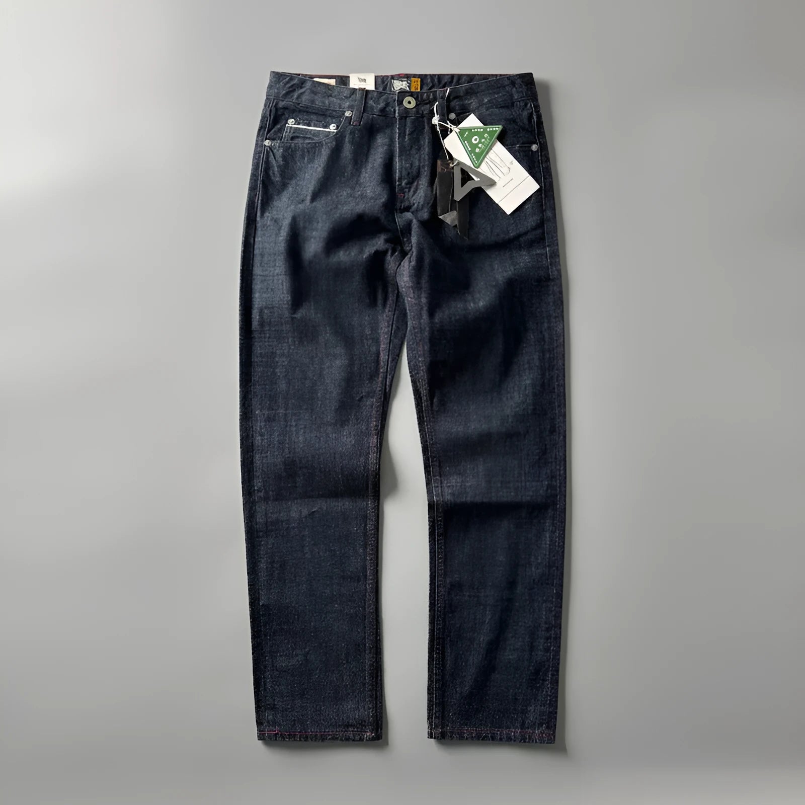 Men's straight leg cotton denim jeans in a primary colour, shown on a mid-waist fit model.