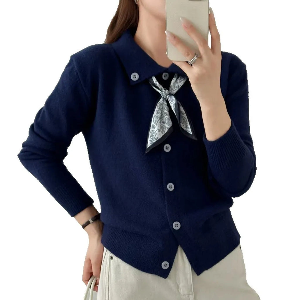 Women's milky white cardigan sweater with a built-in lapel scarf collar and long sleeves.