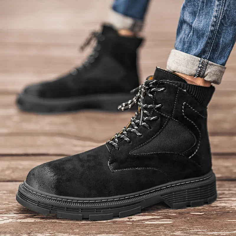Men's vintage Martin boots in black with round toe, thick low heel, and rubber sole.