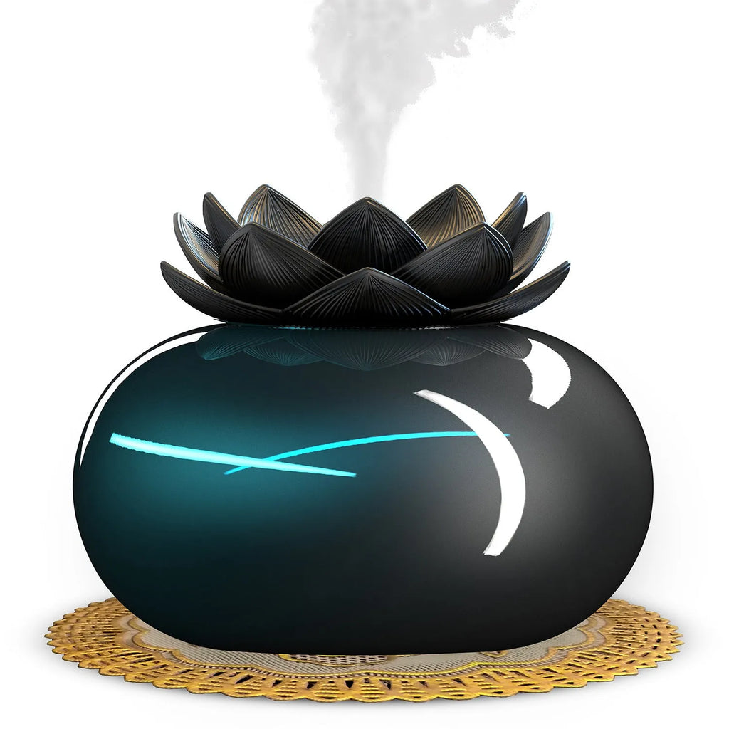 Pure black Lotus ultrasonic aromatherapy humidifier with USB cable and round design.