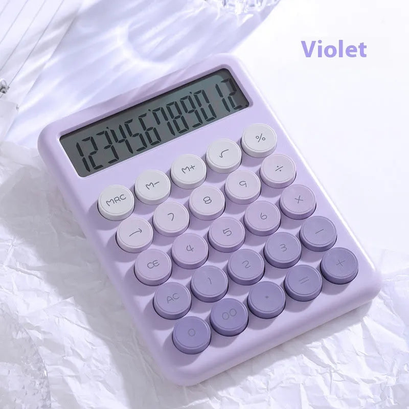 Gradient colour desk calculator showing violet, pink, blue, and green shades on an ABS plastic casing.
