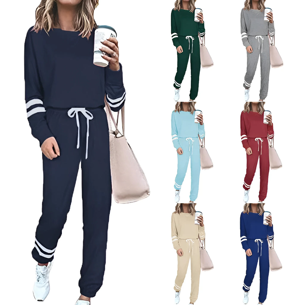 Women's plus size loose-fitting casual suit set in a solid colour, featuring a half-sleeve top and trousers.