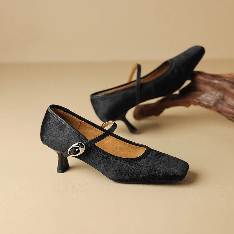 Women's black square toe stiletto ankle-strap heels with a horse hair upper and buckle closure.