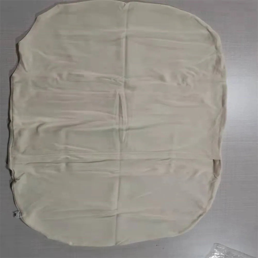 Beige portable baby nest crib for newborns measuring 75cm by 45cm on a neutral background.
