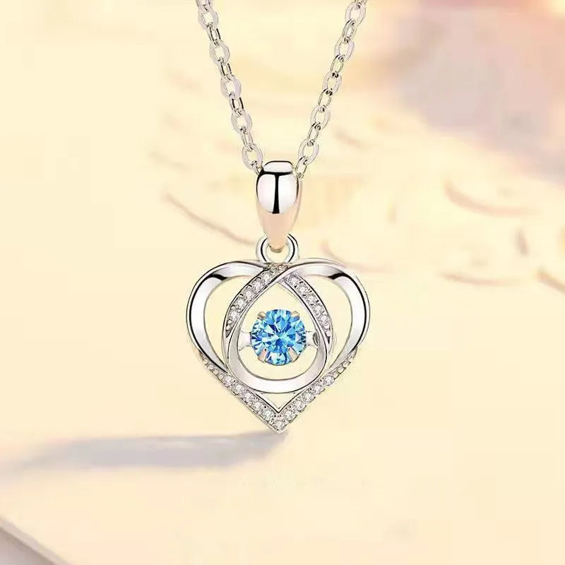 Blue heart pendant necklace and bracelet set with mixed gem inlay on geometric copper jewellery