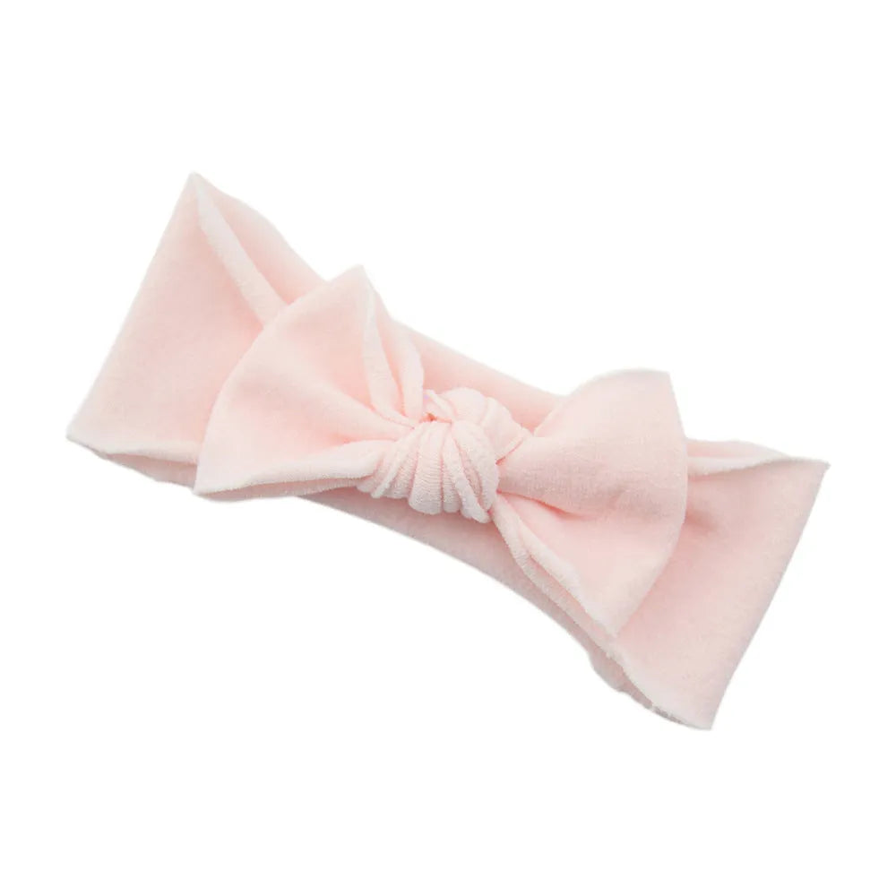 Solid colour knotted cloth headband for baby girls with bowknot design, available in 37 colours