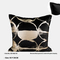 Black gold abstract pattern flannel cushion pillow in square and rectangular sizes on a sofa.