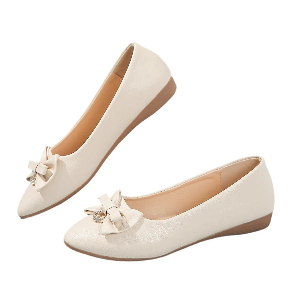 Women's beige casual flat shoes with a bowknot and round toe, showing the shallow mouth design.