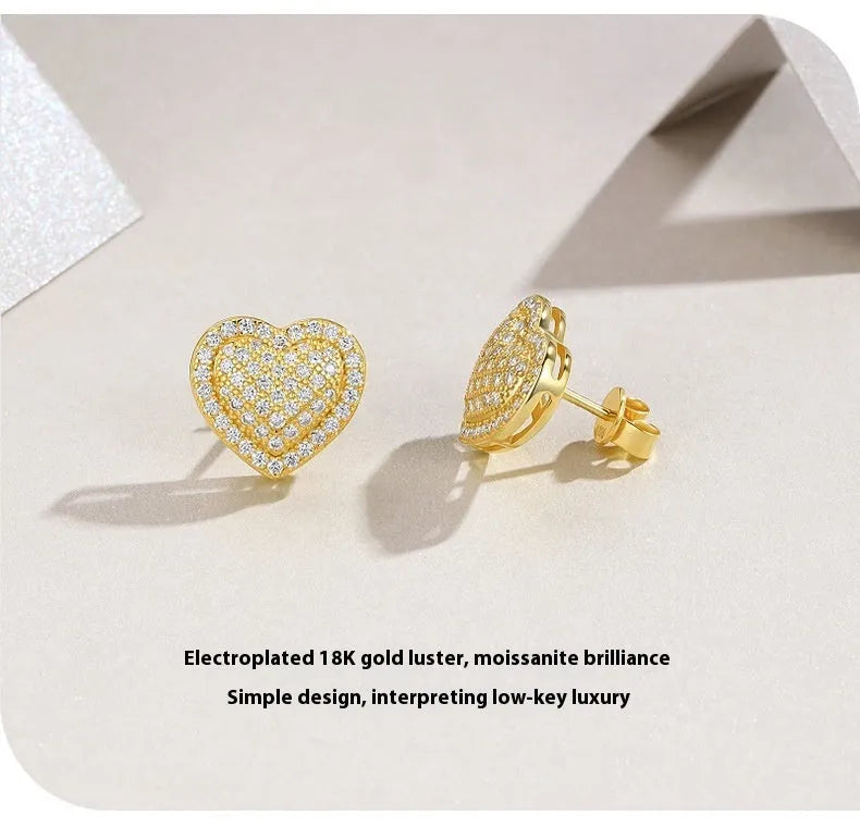 Golden heart-shaped stud earrings with moissanite centre on S925 silver posts