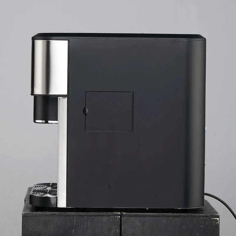 Black desktop ice making machine with stainless steel interior, showing ice maker, crusher, and cold water dispenser functions