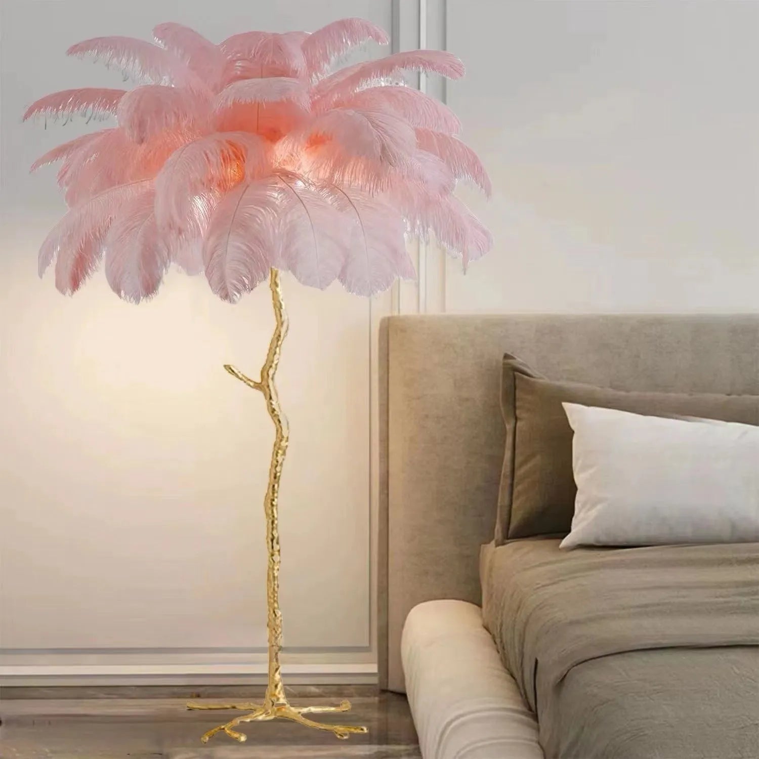 Tall decorative floor lamp with many white resin feathers, standing in a living room corner.