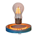 Magnetic levitation night lamp showing floating 3D printed celestial ornament above base unit