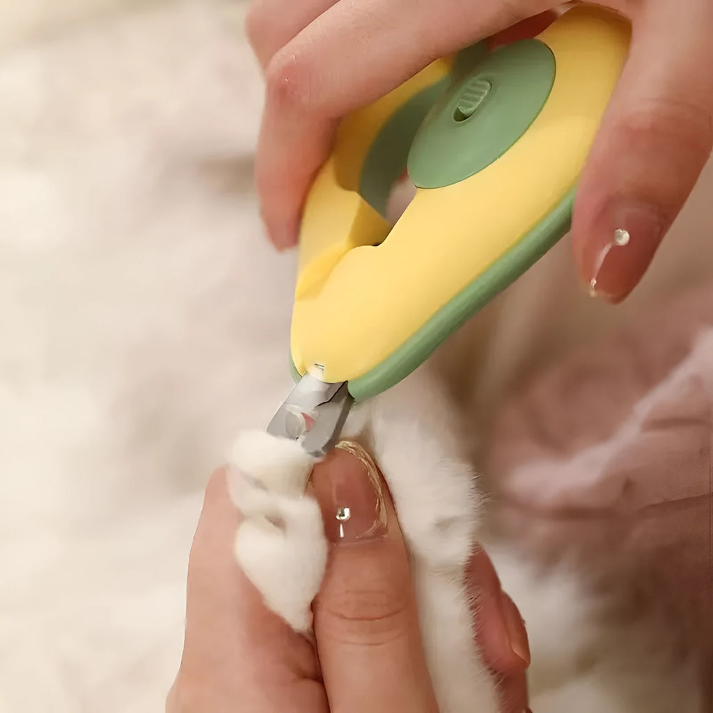 Pet nail clipper with LED light in green colour for trimming cat and small dog claws