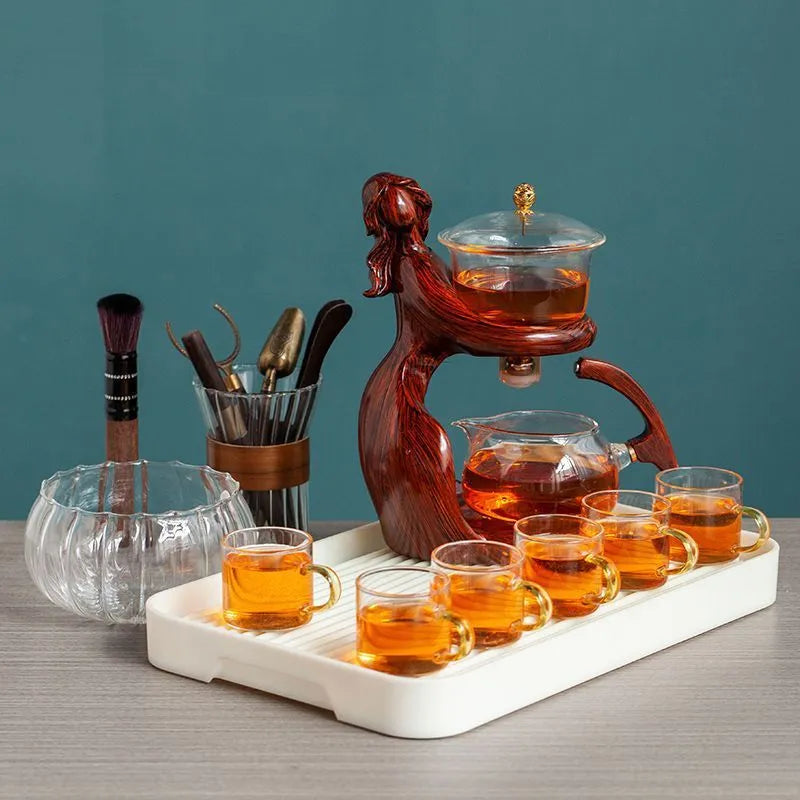 Maid semi-automatic tea set with borosilicate glass teapot, stainless steel filter, and Chinese-style woman sculpture base