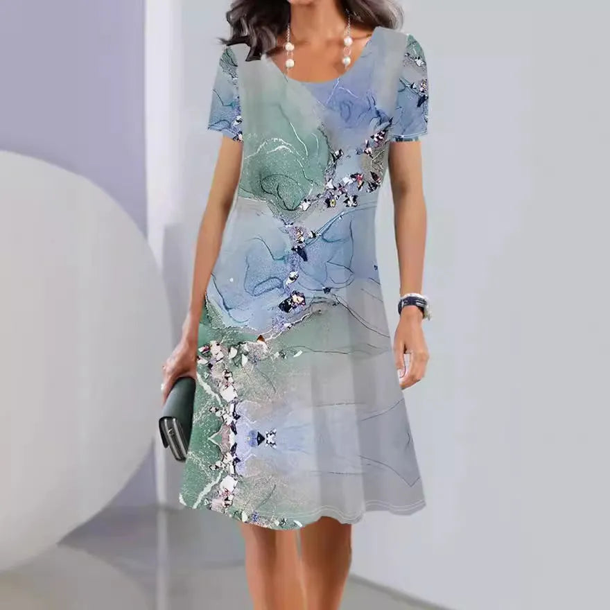 Women's floral print A-line summer dress in ice silk fabric with short sleeves and round neck.