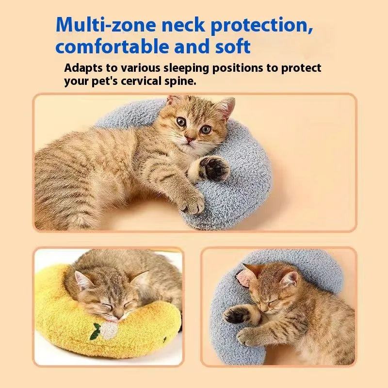 Blue U-shaped pet pillow for cat neck support with moon design on cloth material