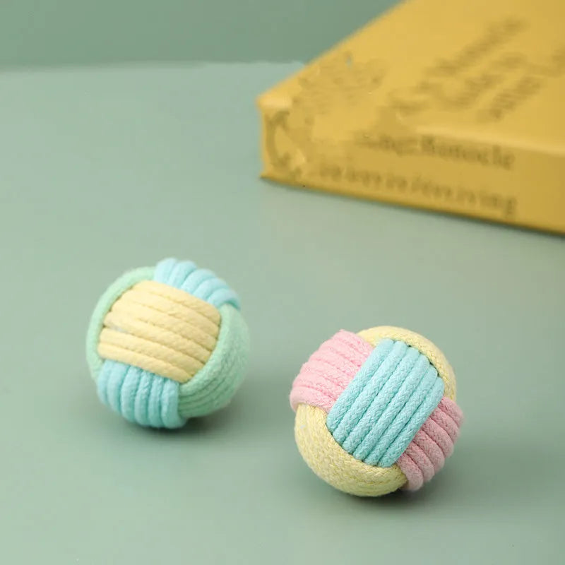 Handmade cotton cat hairball plush toy in blue-pink, green-blue, or pink-green colours, 5cm in diameter.