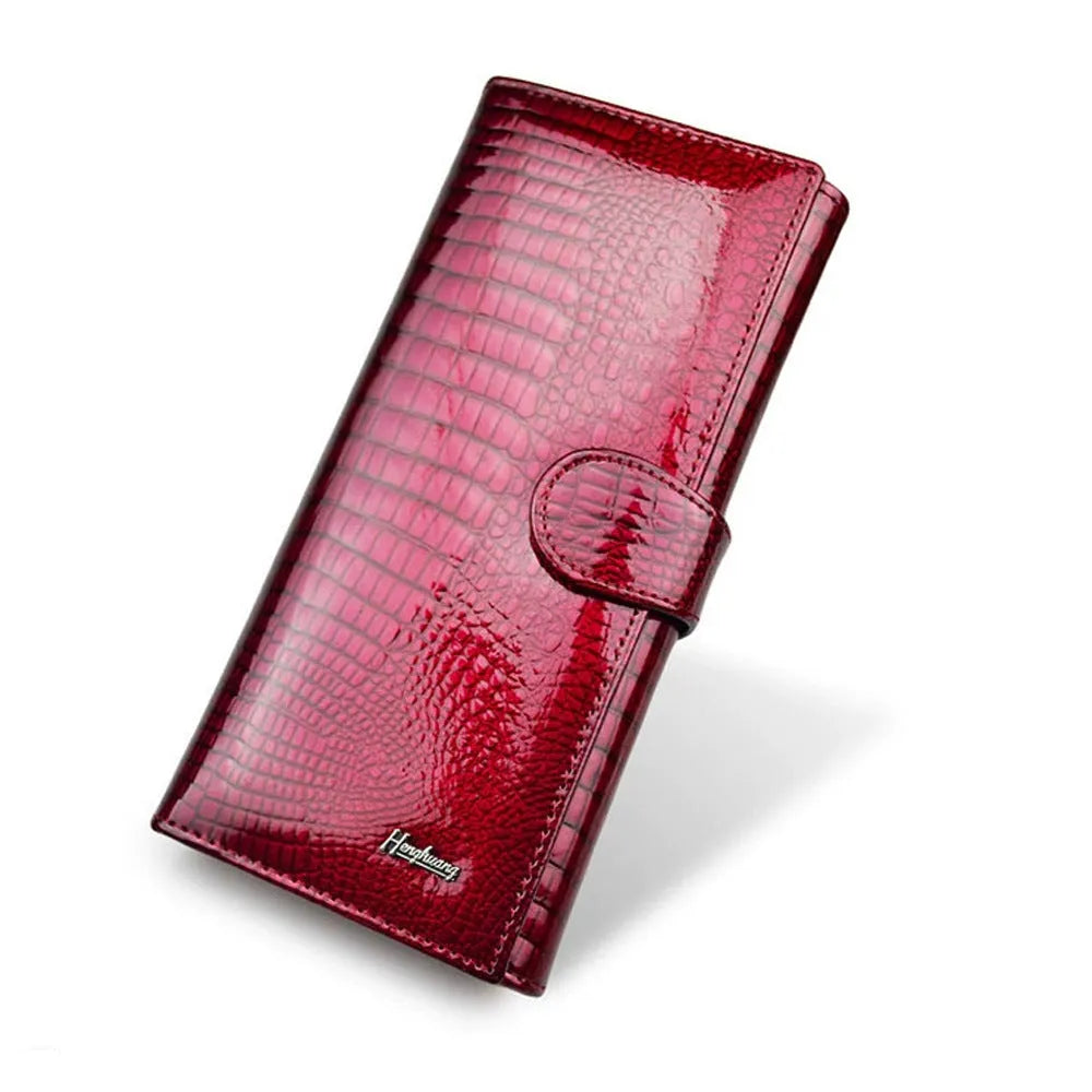 Women's genuine leather coin purse with crocodile pattern detailing in red, wine red, and black colour options
