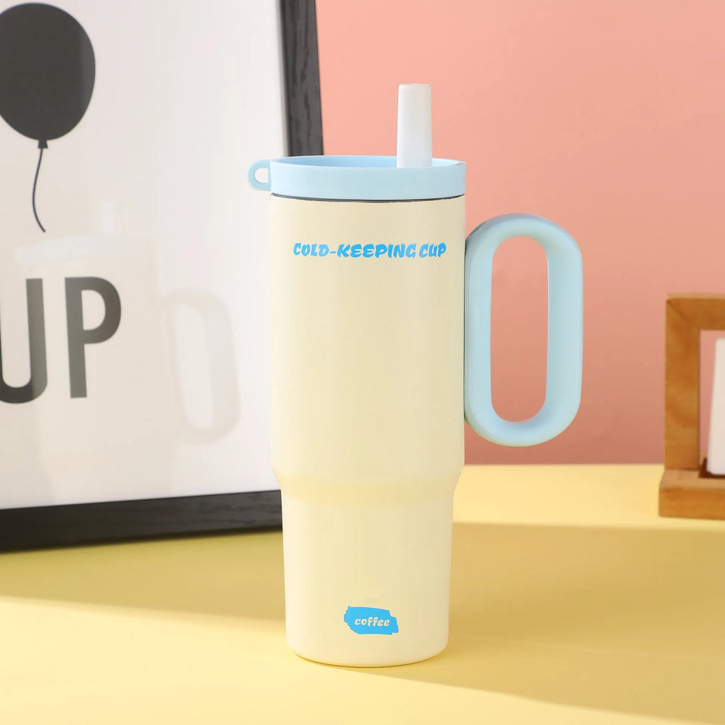 Large insulated plastic straw cup with a carry handle and lid, shown in assorted colours.