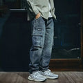 Men's blue loose straight retro jeans with stretch denim fabric and zip fly closure