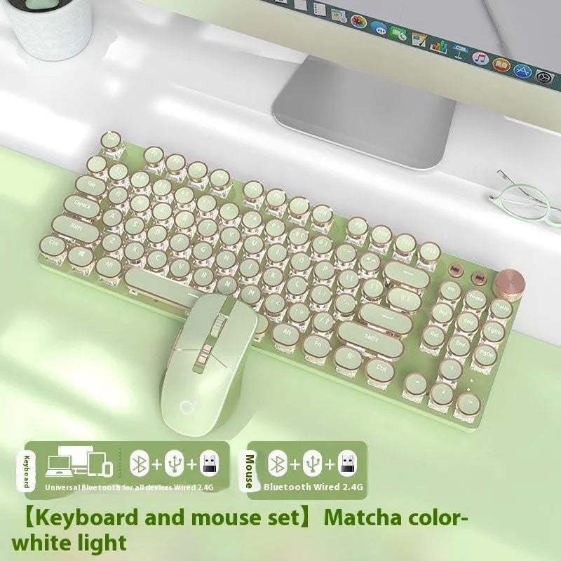 Matcha green mechanical gaming keyboard with multifunction knob on a desk