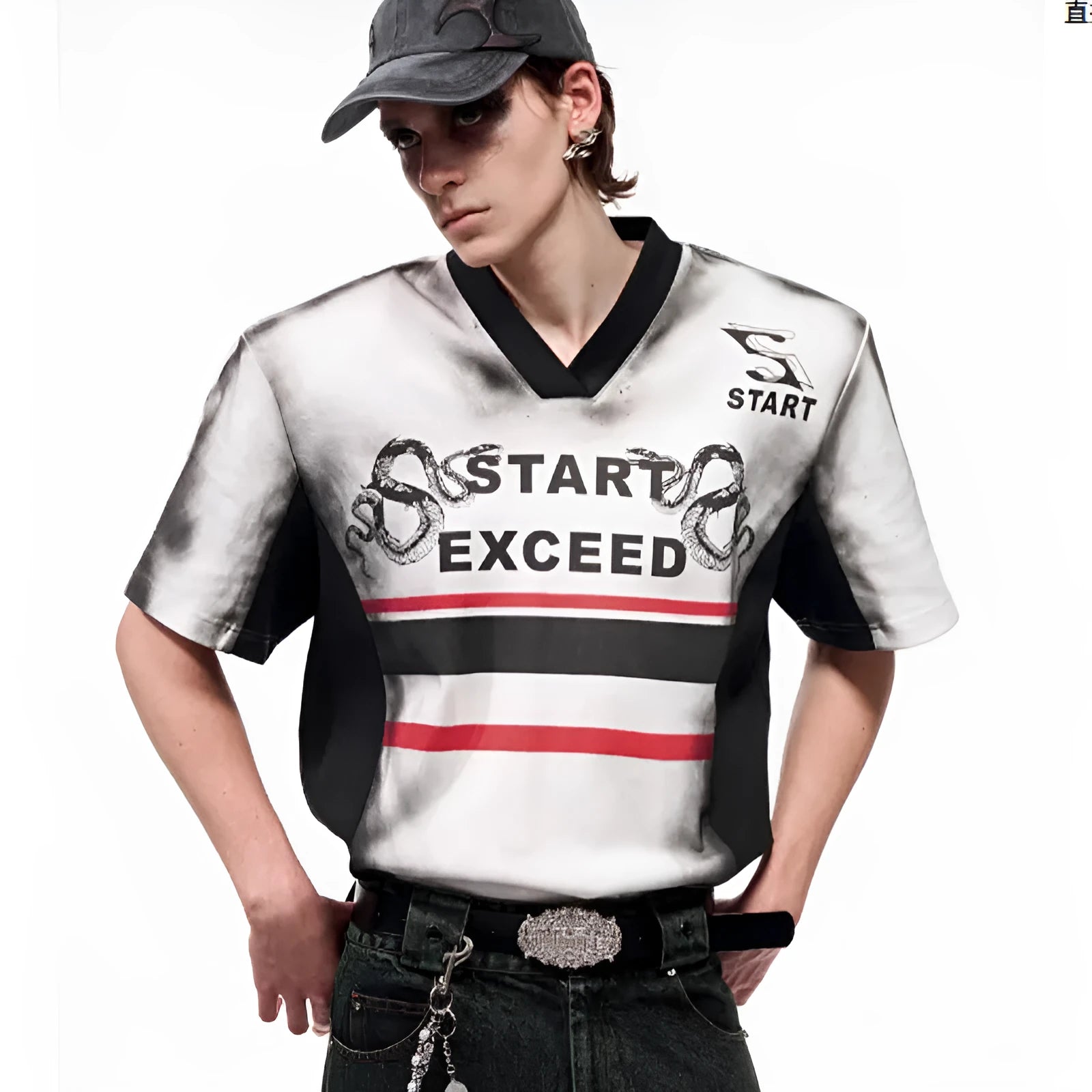 Women's short sleeve V-neck top with a black and white letter snake pattern print and padded shoulders.