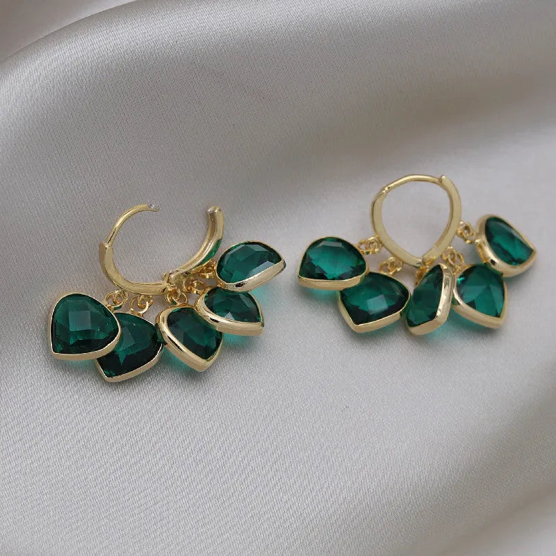 Korean style green heart glass ear clip earrings with dancing pendant design
