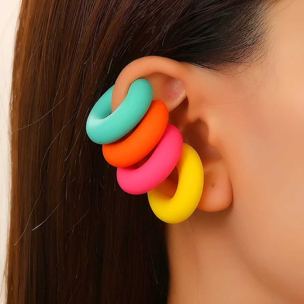 C-shaped geometric clip-on earrings in matte coarse texture with 15 candy colour options including yellow, cyan, purple and pink