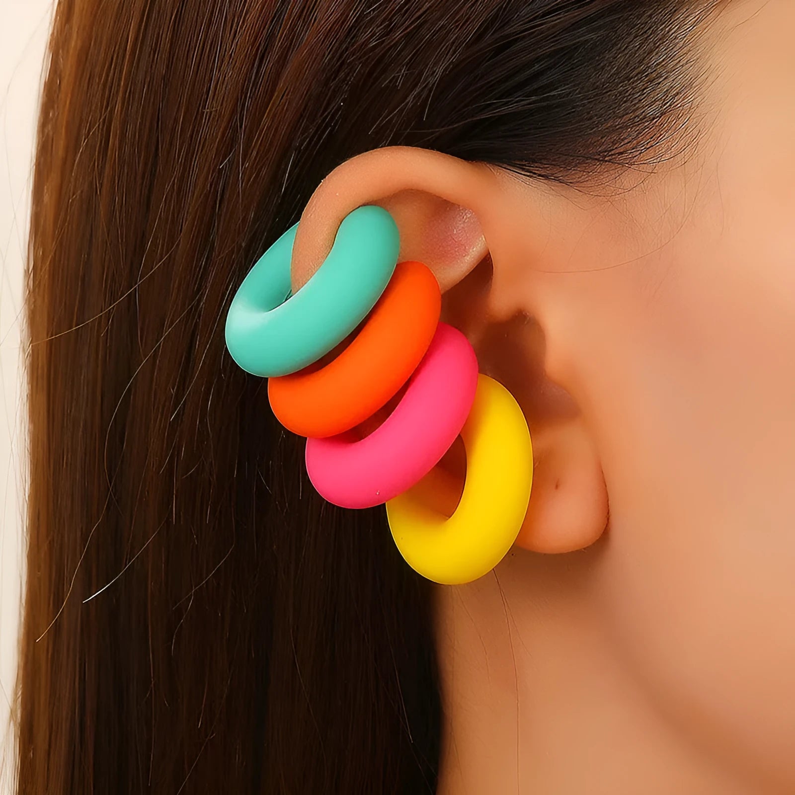 C-shaped geometric clip-on earrings in matte coarse texture with 15 candy colour options including yellow, cyan, purple and pink